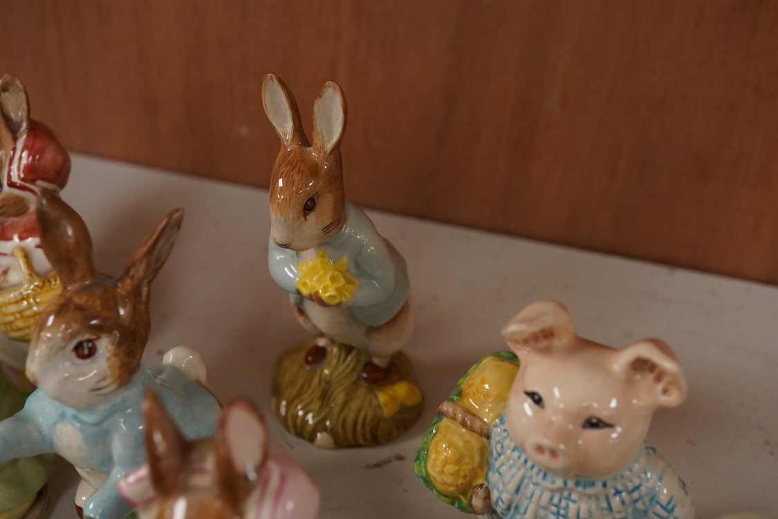 Twenty Beatrix Potter figures, mostly later production figures, largest 11cm high